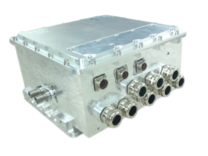 Dual-channel high-voltage controller showing metallic housing, cooling ports, electrical connectors, and compact rectangular shape; installed in electric vehicle powertrainDual-channel high-voltage controller showing metallic housing, cooling ports, electrical connectors, and compact rectangular shape; installed in electric vehicle powertrain